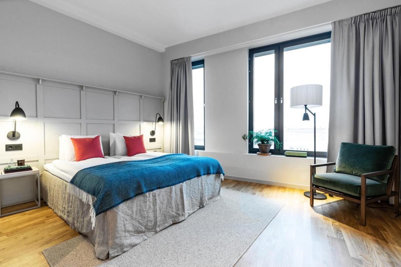 Biz Apartment Bromma Stockholm Buitenkant foto A room at the hotel