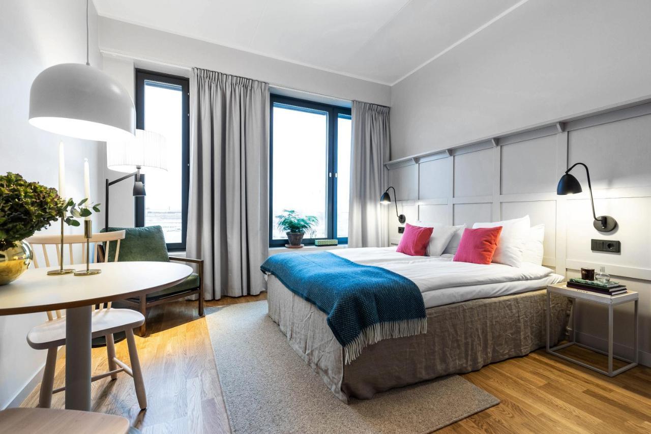 Biz Apartment Bromma Stockholm Buitenkant foto A room at the hotel