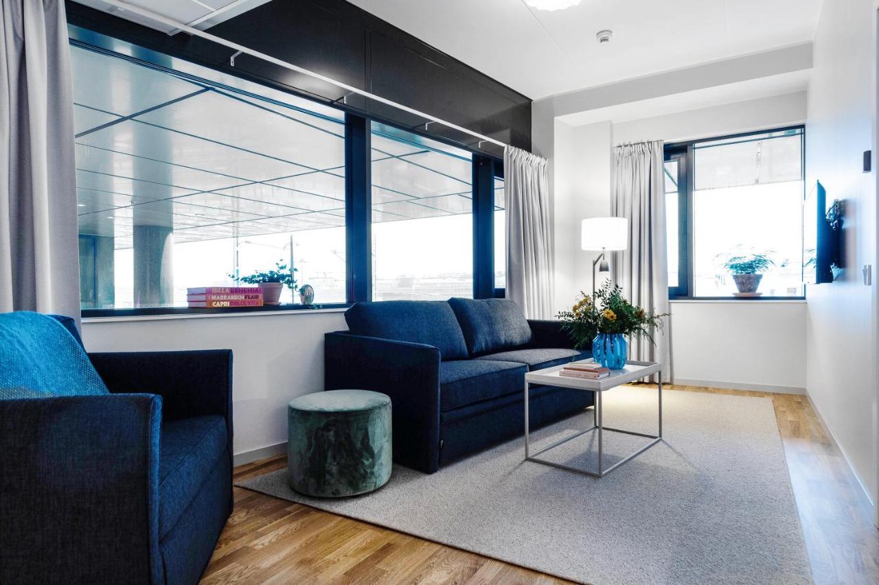 Biz Apartment Bromma Stockholm Buitenkant foto A living room in a serviced apartment